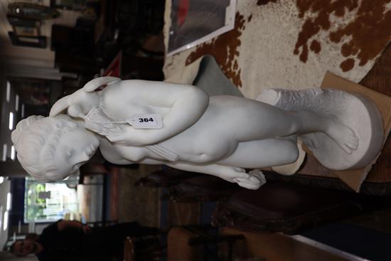 A marble figure of a nude female, a bird on her shoulder, signed Bouzadou (?), height 75cm